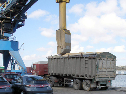 Filling a truck with grain Filling a truck with grain